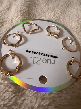 Gold-Tone Rings - 8 Pieces (Assorted Sizes 6-8)